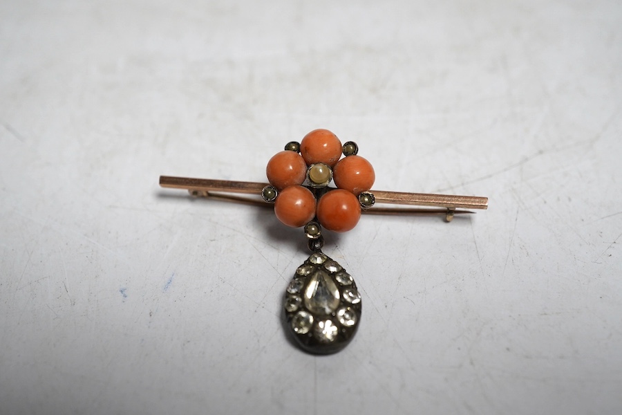 A Victorian coral, paste and seed pearl bar brooch, unmarked. Condition - some wear to the stones, otherwise fair